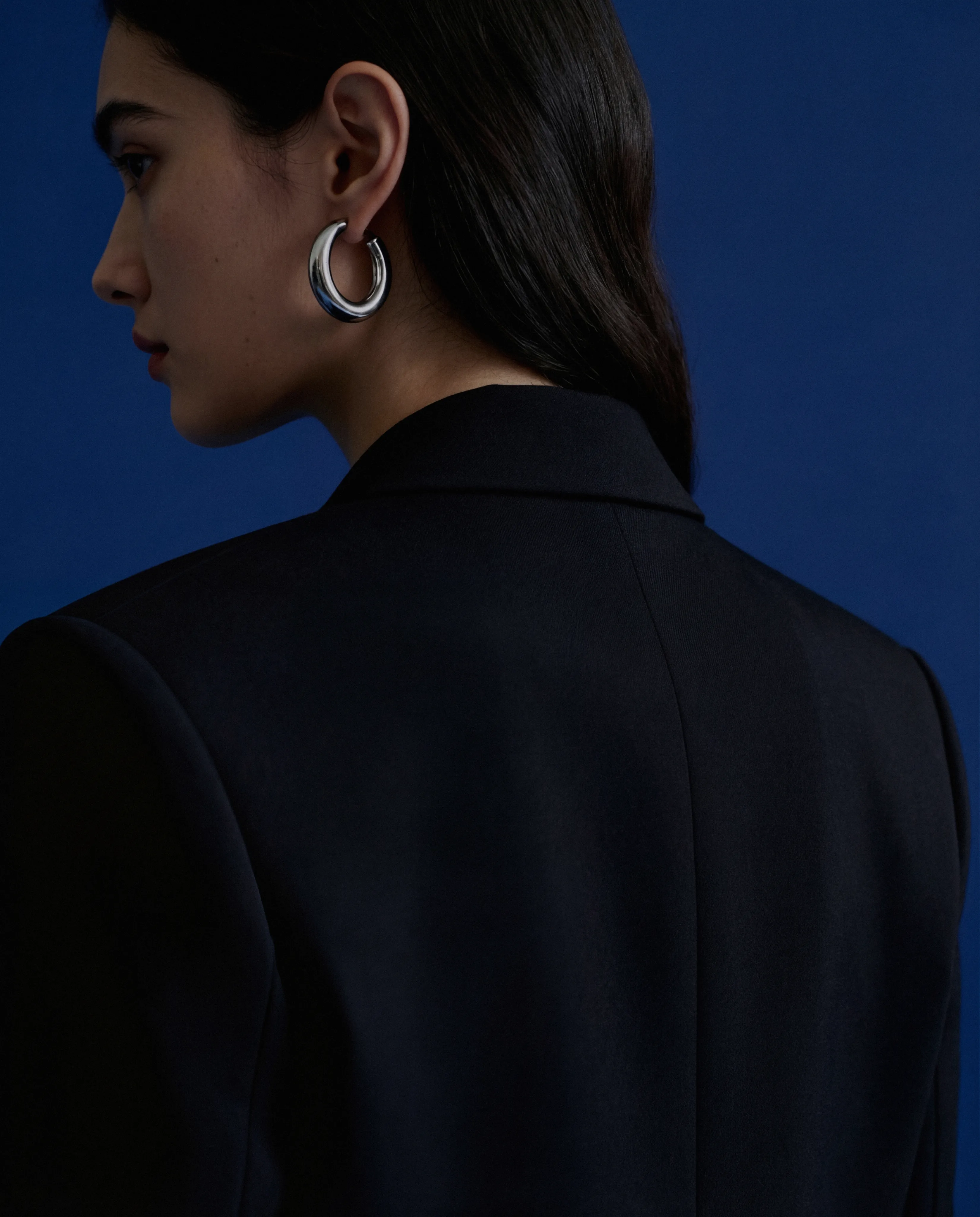 A woman with blue background